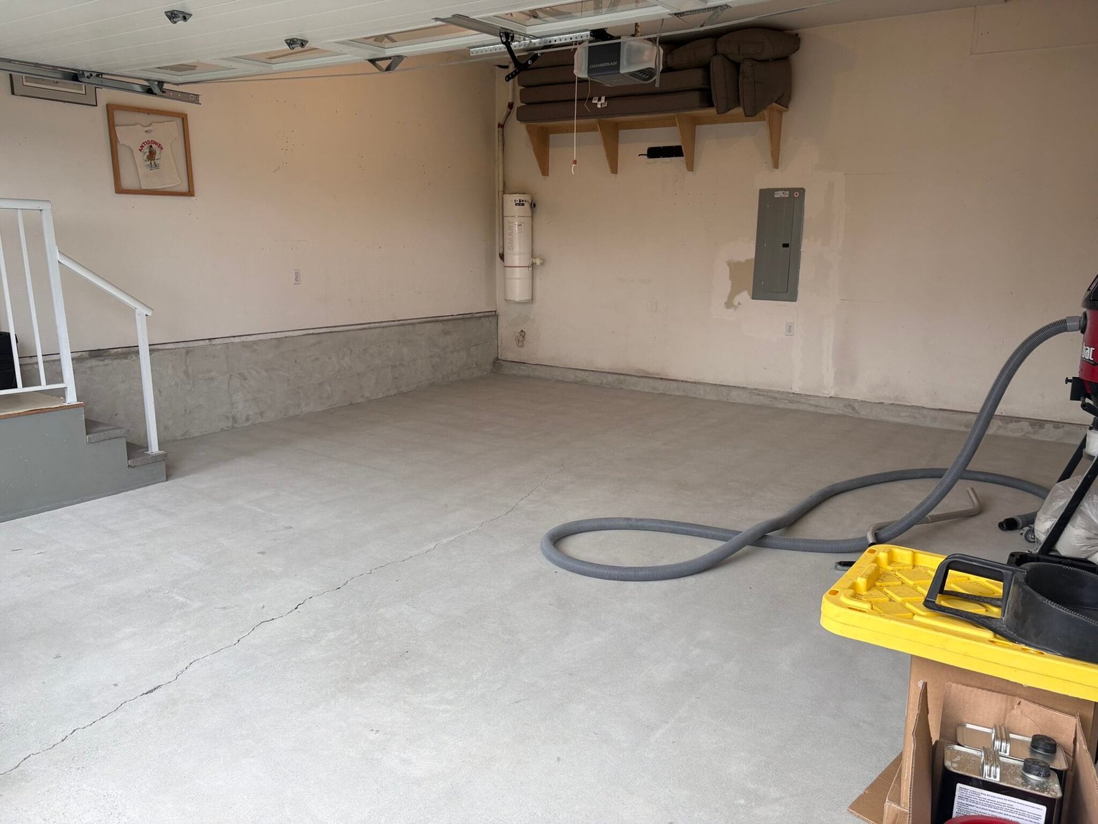PREPPED CONCRETE GARAGE FLOOR - AFTER GRINDING BEFORE CRACK REPAIRING